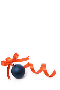 Close-up of christmas decorations over white background