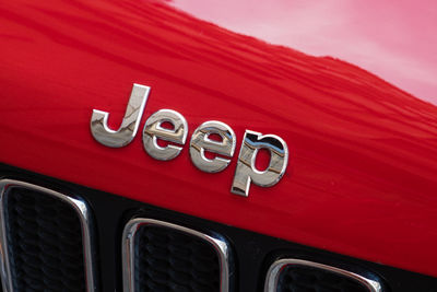 Close-up of red vintage car