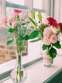 Close-up of flowers in vase on table