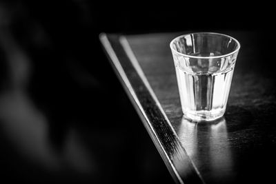 Glass of water on table
