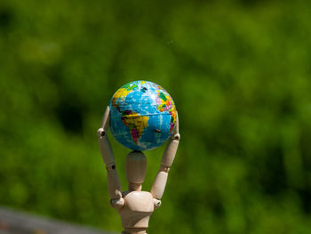 Close-up of multi colored ball on tree