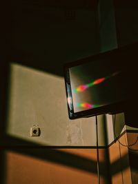 Close-up of laptop on table at home