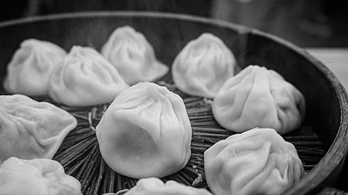 Close-up of garlic in plate on table