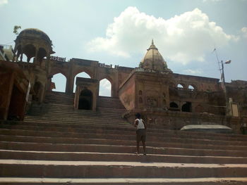 Low angle view of steps against sky