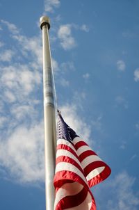 Low angle view of flag against sky