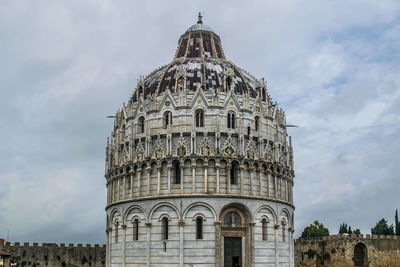 Pisa baptistery in tuscany, italy. low angle view of a historical building.