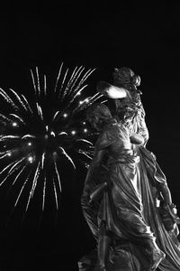 Low angle view of firework display