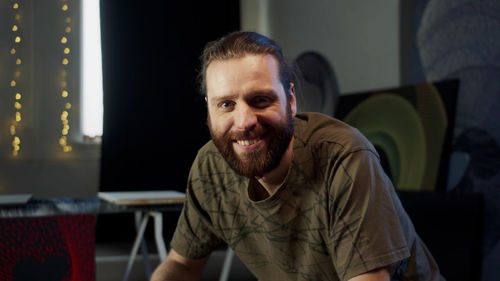 Portrait of man sitting outdoors