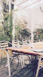 Empty chairs and table in cafe