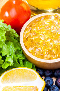 High angle view of oranges in bowl on table