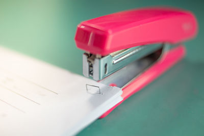 High angle view of red container on table