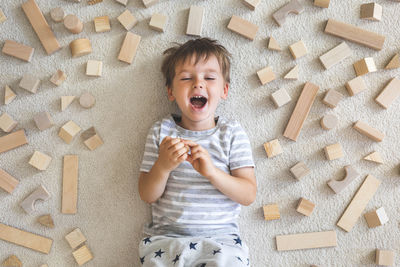 Portrait of boy playing with toy blocks