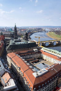 High angle view of bridge and buildings in city