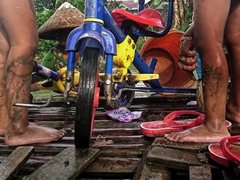 Low section of man working on wood