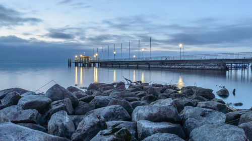Groyne in sea against sky