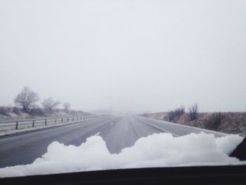 Road passing through field