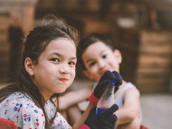 Portrait of mother and daughter outdoors