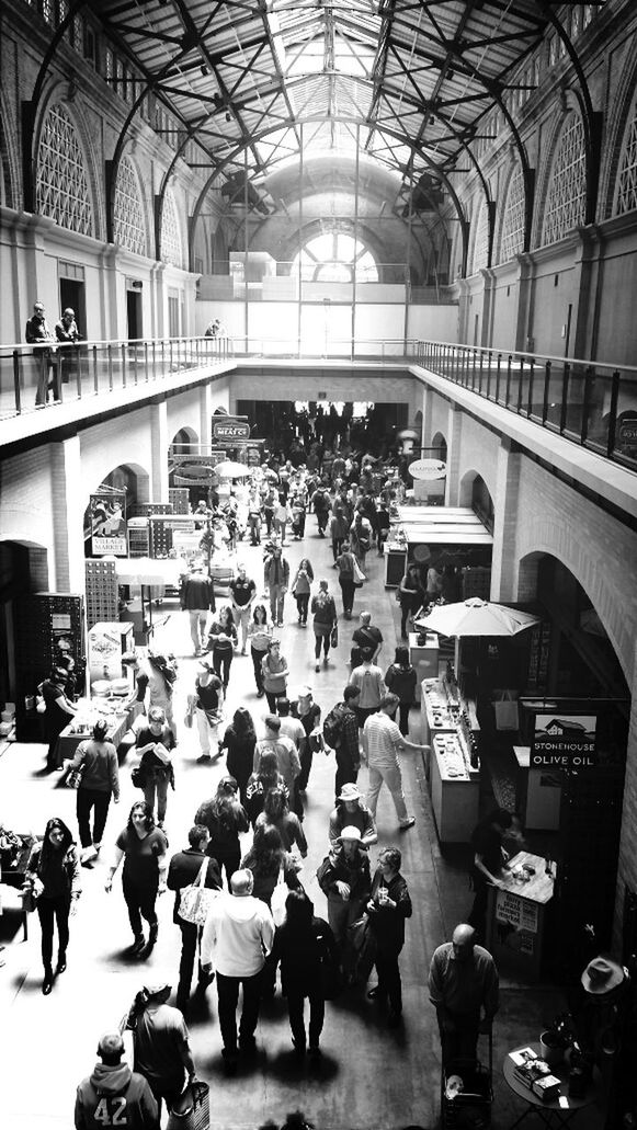 large group of people, person, men, indoors, crowd, lifestyles, city life, architecture, mixed age range, walking, built structure, leisure activity, market, city, high angle view, transportation, street, shopping mall, shopping