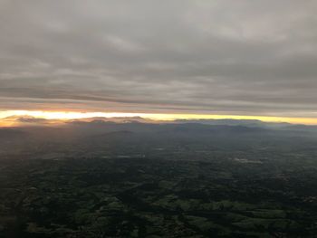 Scenic view of landscape against sky during sunset