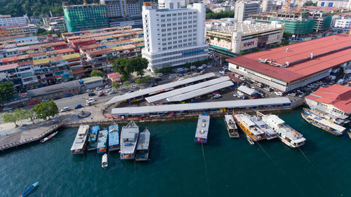 High angle view of commercial dock by sea