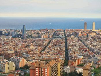 Cityscape with sea in background