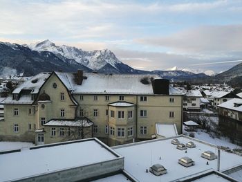 Buildings against sky during winter