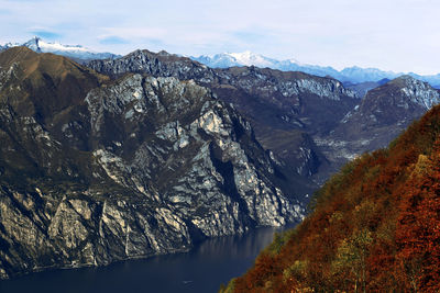 Autumn foliage garda aerial view from trails, trentino, italy