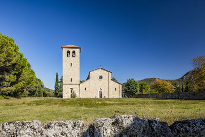 Historic building against clear blue sky