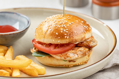 Close-up of burger in plate on table