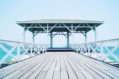 Pier against clear sky