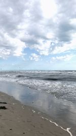 Scenic view of beach against sky