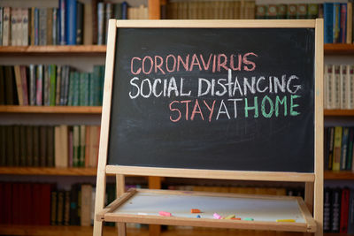Close-up of text on book at table
