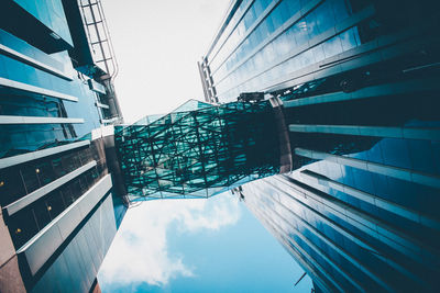 Low angle view of modern buildings against sky
