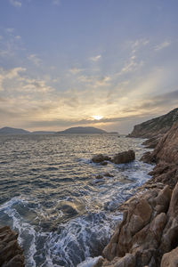 Scenic view of sea against sky during sunset