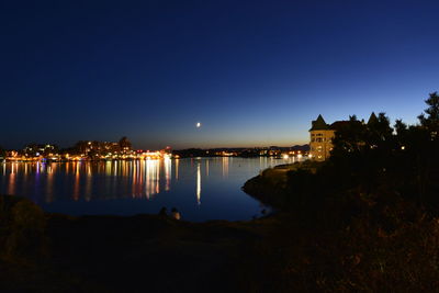 View of illuminated city at night