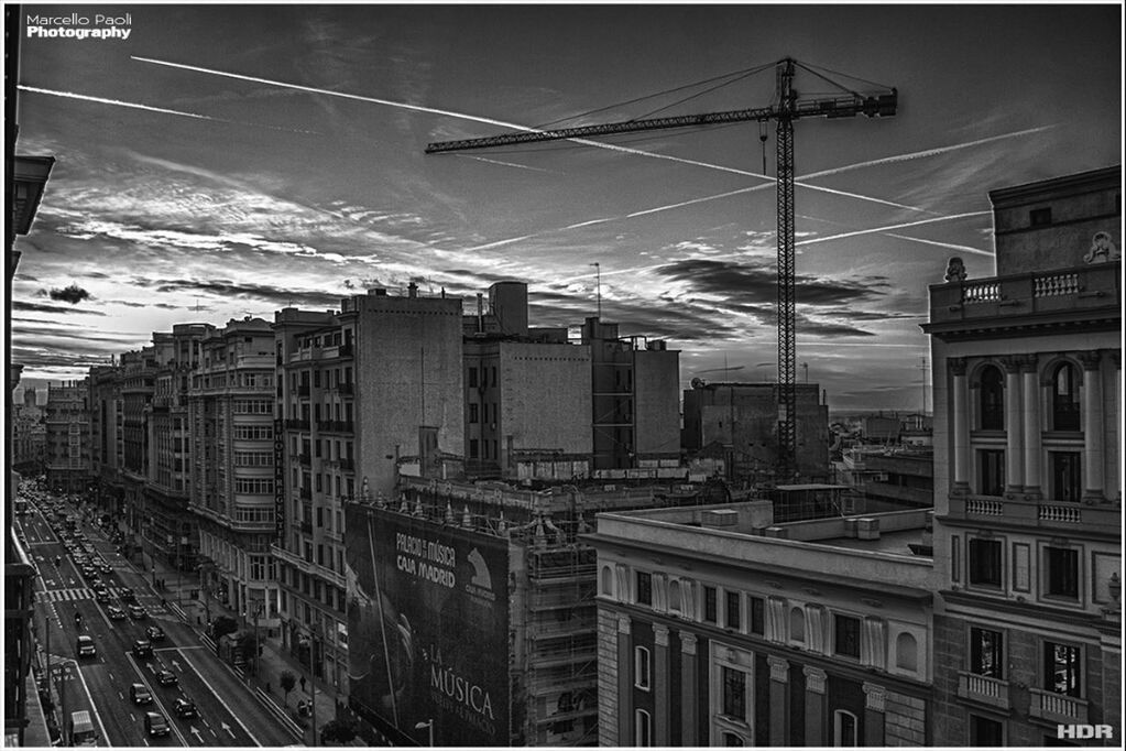 architecture, built structure, cable, building exterior, sky, city, outdoors, no people, city life, day, transportation, skyscraper, electricity, cityscape, electricity pylon