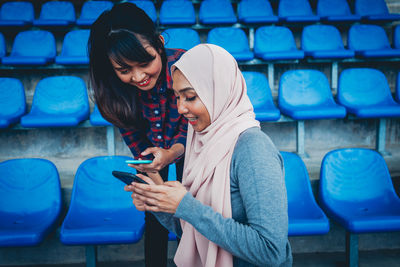 Young woman using mobile phone