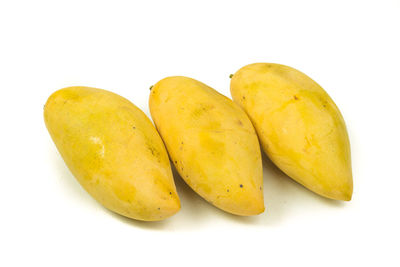 Close-up of fruits against white background