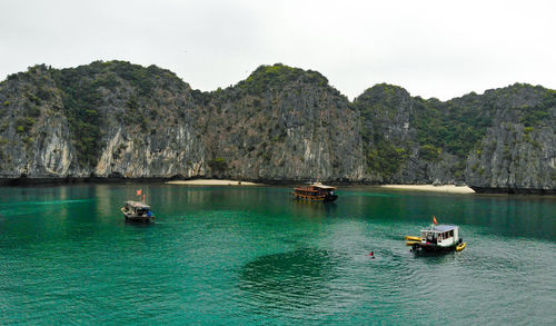 Houseboats at the sea in lan ha bay, vietnam.