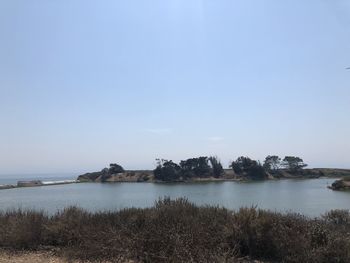 Scenic view of sea against clear sky