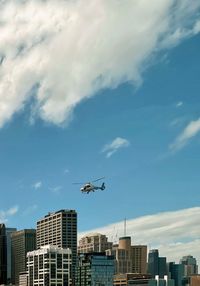 Low angle view of cityscape against sky