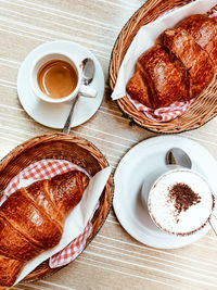 High angle view of coffee served on table