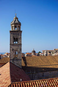 Tower of building against blue sky