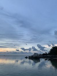 Scenic view of sea against sky at sunset