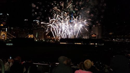 Firework display at night