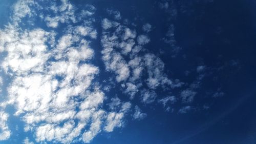 Low angle view of clouds in blue sky