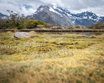 Scenic view of snowcapped mountains against sky