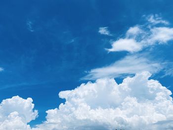 Low angle view of clouds in blue sky