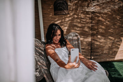 Young woman using mobile phone