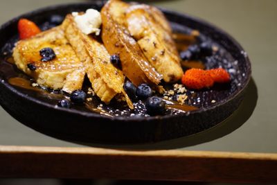 Close-up of breakfast served in plate on table